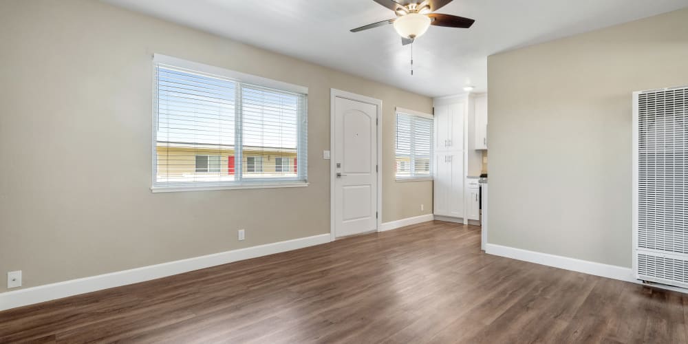 Unfurnished living room with hardwood floors at Bon Aire Apartments in Castro Valley, California