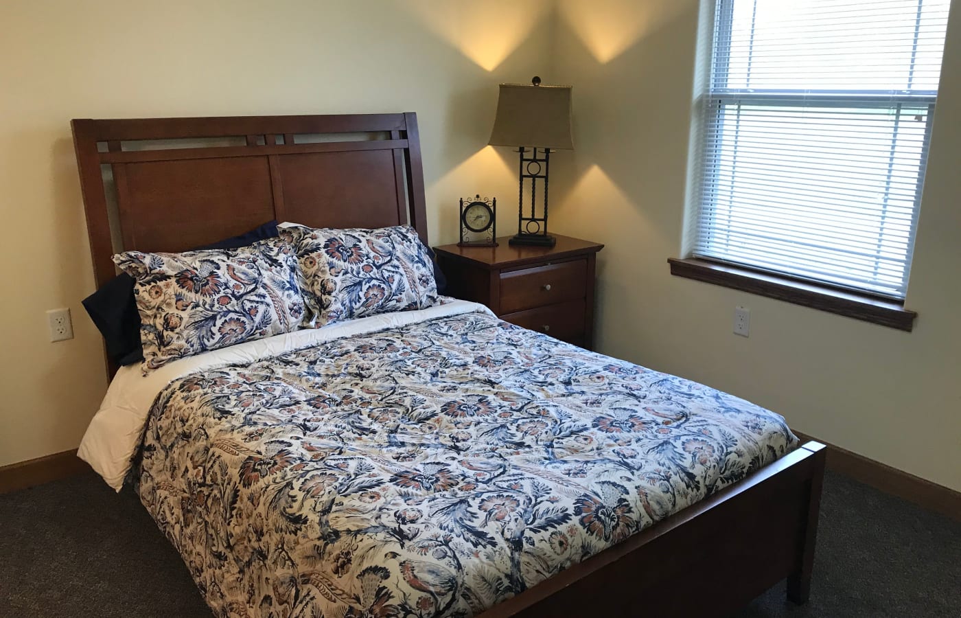 A comfortable bedroom at Prairie Hills Senior Living in Des Moines, Iowa
