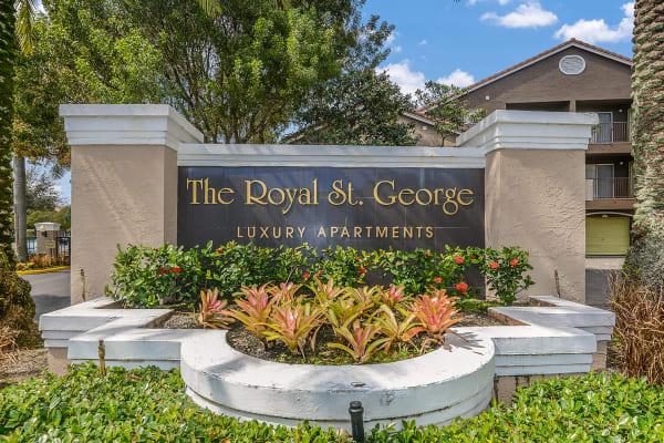 Monument sign at Royal St. George at the Villages Apartment Homes in West Palm Beach, Florida
