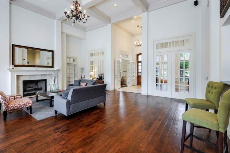 Living room with a fireplace at Plantation Apartments in Gulfport, Mississippi