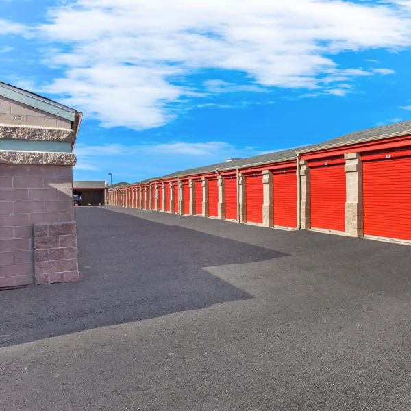 Drive-up storage units with wide drive aisles at StorQuest Self Storage in Parker, Colorado