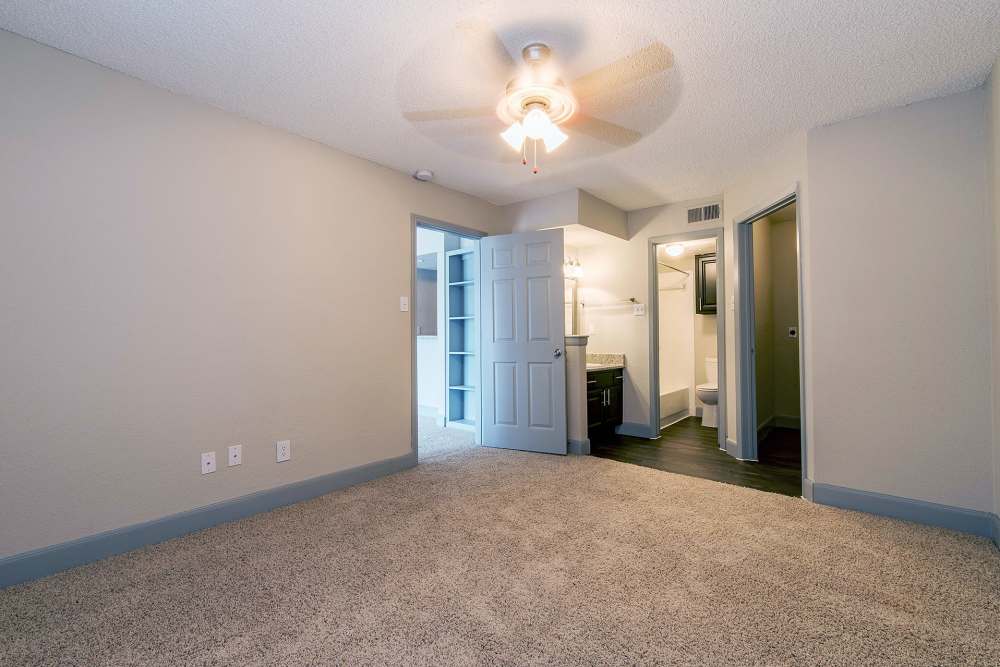 Modern apartment bedroom at Ashmore in Pasadena, Texas