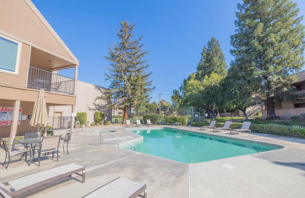 Serene swimming pool at Riverview Gardens Apartments in Fresno, California