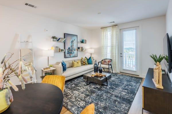 Large and brightly lit living room interior at The Collins in Charlotte, North Carolina