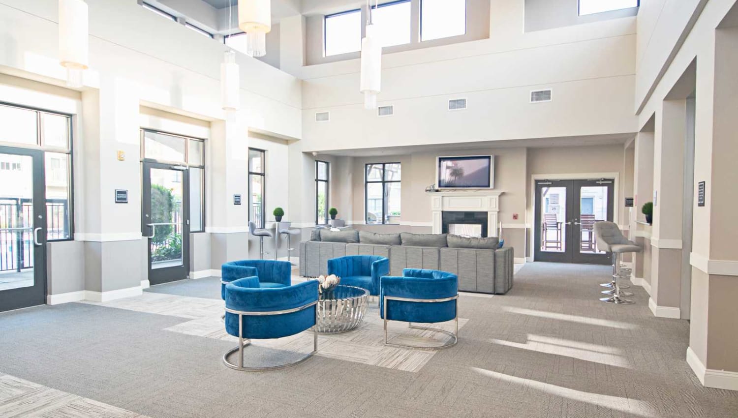 Clubhouse with vaulted ceilings and a fireplace at SouthPark Morrison in Charlotte, North Carolina