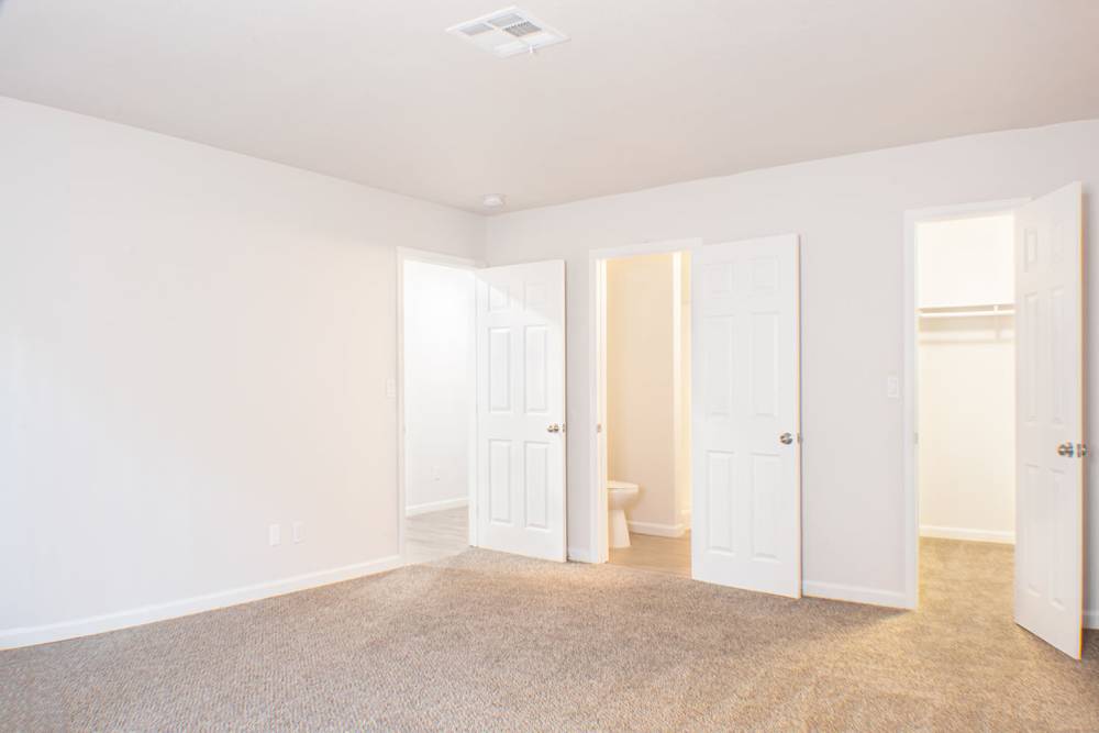 Master bedroom with connecting bathroom at Sand Pebble and Spanish Oaks in Sparks, Nevada