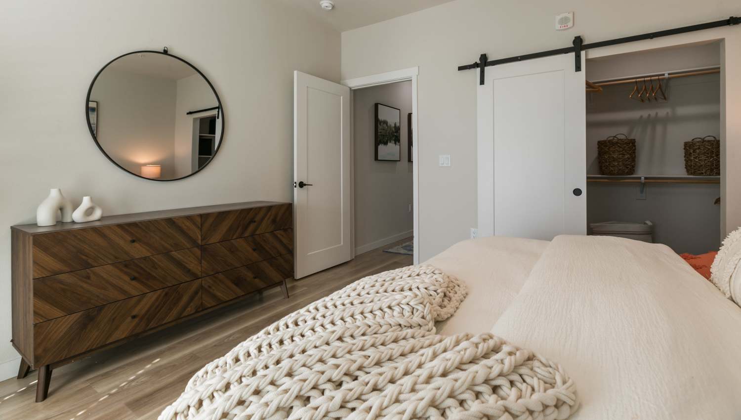 Bedroom with access to closet at Olympus Latitude in Albuquerque, New Mexico