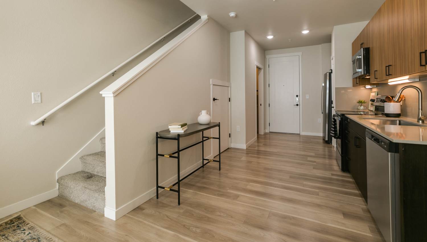 Steps with view of kitchen at Olympus Latitude in Albuquerque, New Mexico