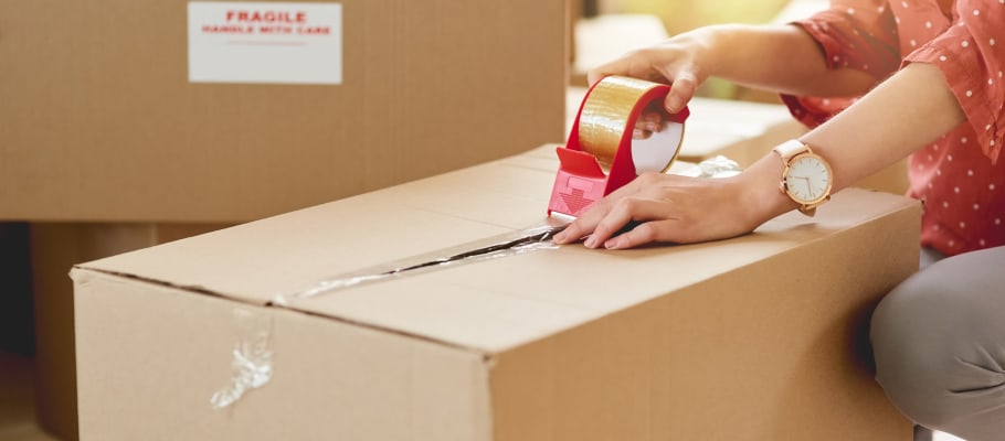 A box getting taped shut before it's stored at A-1 Self Storage in San Diego, California