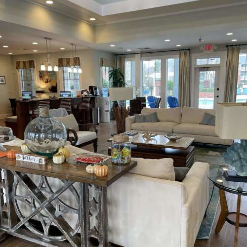 Community clubhouse interior with lounge seating and gathering space at Haven at Wild Dunes in Newport, North Carolina