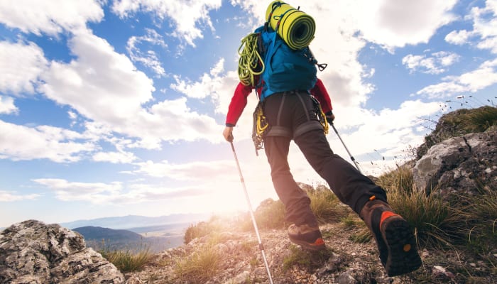 A man enjoying a hike in the mountains near STOR-N-LOCK Self Storage in Taylorsville, Utah