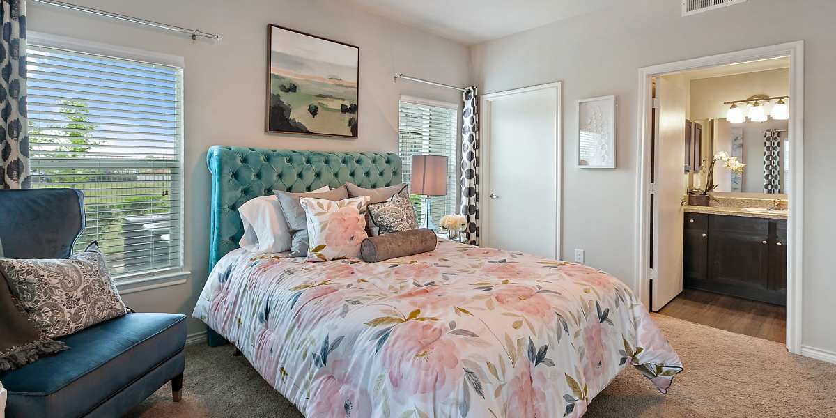 Spacious bedroom with king size bed at Canyon House in New Braunfels, Texas