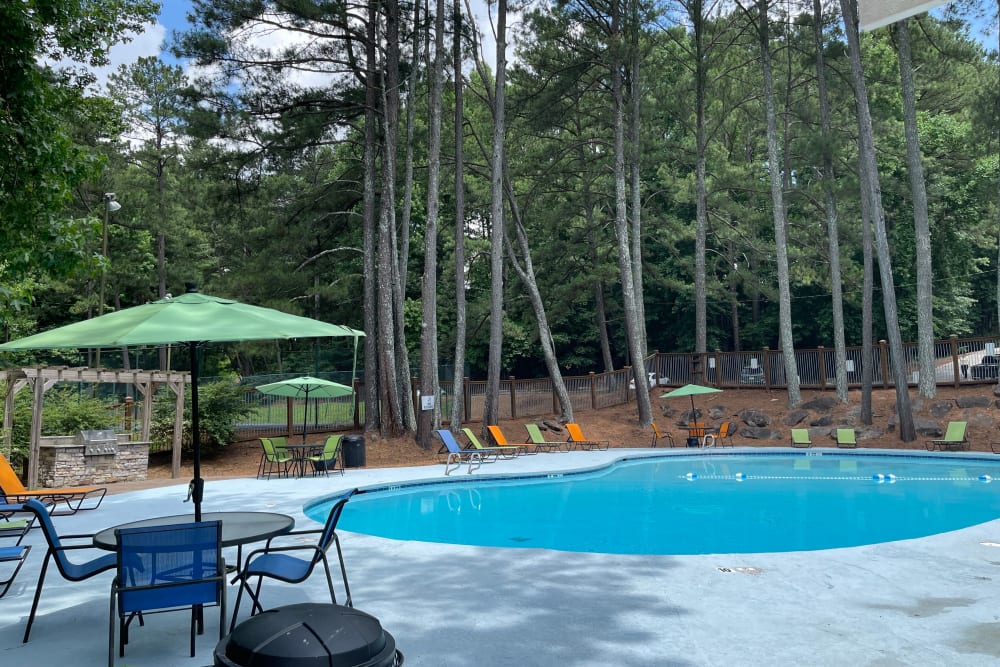 Swimming pool next to trees at Parkside in Doraville, Georgia