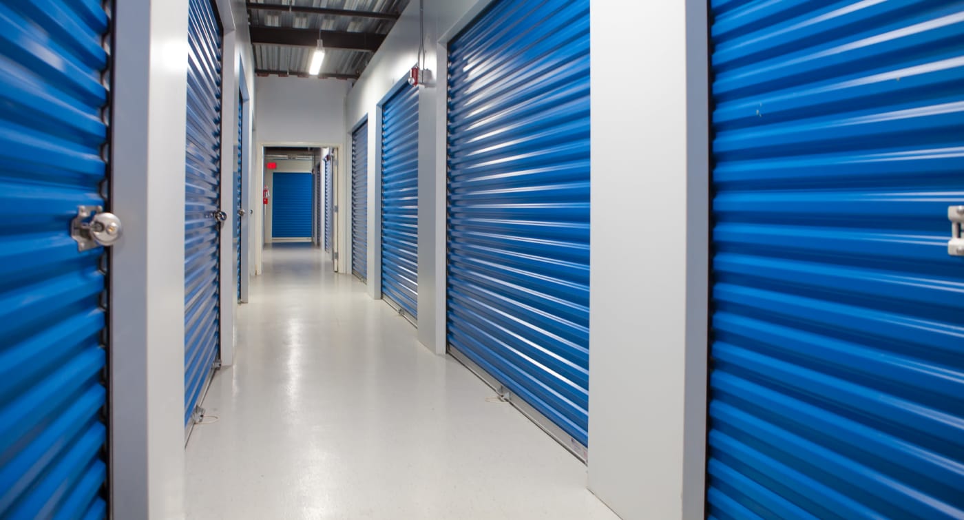 Interior units with blue doors at Atlantic Self Storage in St. Augustine, Florida