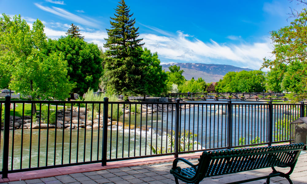 An unfurnished kitchen with a few appliances and a window in a model home at Truckee River Terrace in Reno, Nevada.