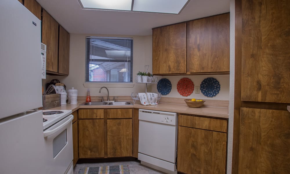 Kitchen at Woodscape Apartments in Oklahoma City, Oklahoma