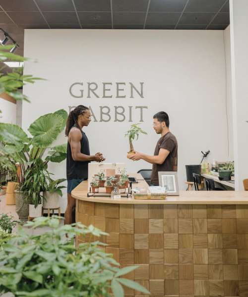 Men buying plants near St. Albans Lofts in Raleigh, North Carolina