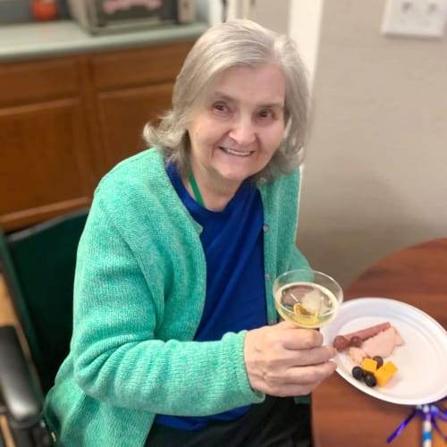 Resident with a meat and cheese platter at Canoe Brook Assisted Living in Broken Arrow, Oklahoma