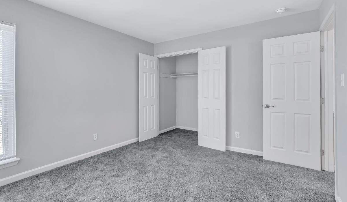 A beautiful bedroom with closet area at BayPointe Crossing in Virginia Beach, Virginia