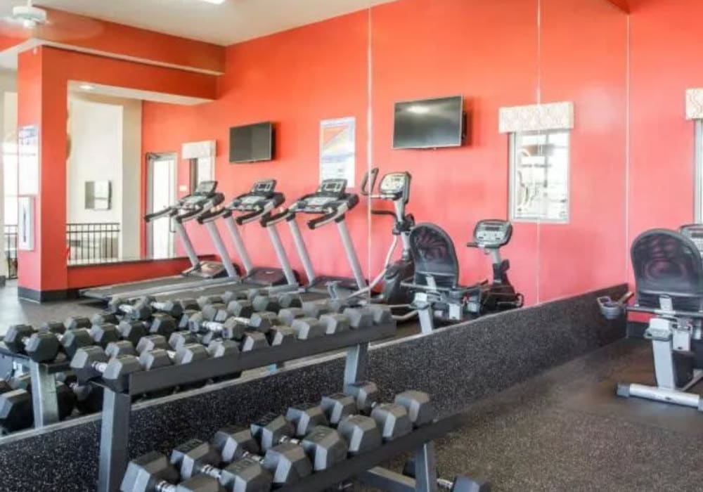 Free weight station in fitness center at Arrington Ridge in Round Rock, Texas