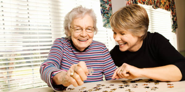 Resident and daughter having fun during visiting hours at Holton Manor in Elkhorn, Wisconsin