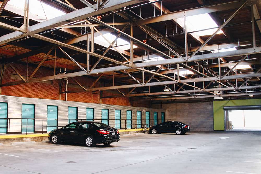 Parking area with storage units at Courtyard Lofts at Scott’s Addition in Richmond, Virginia