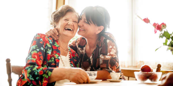 Resident and daughter having tea together at Ingleside Communities in Mount Horeb, Wisconsin