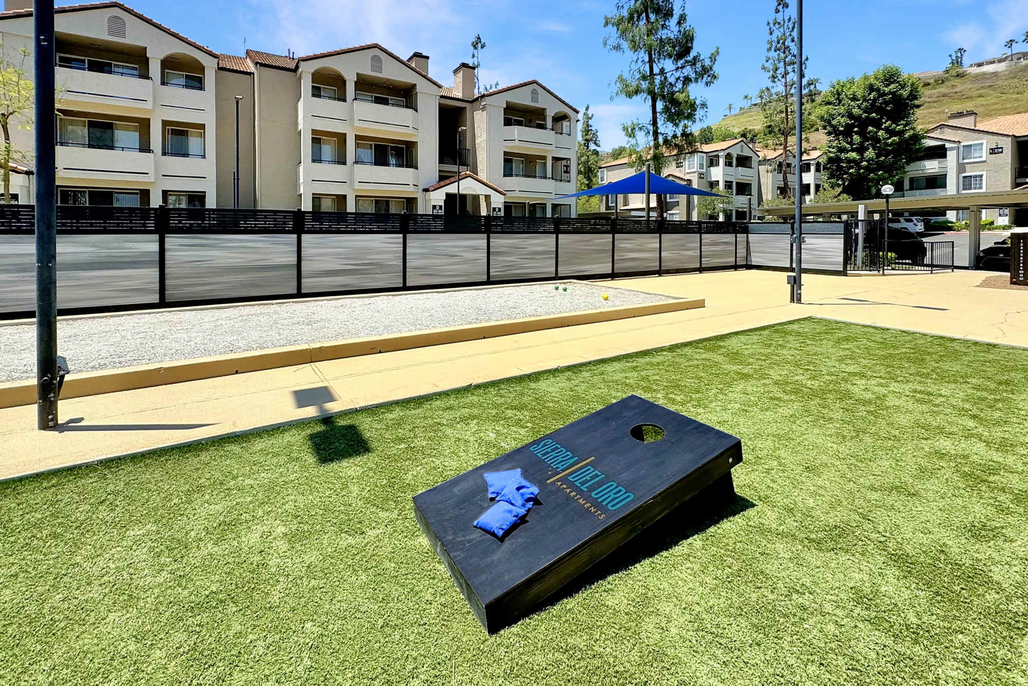 A bocce ball court at Sierra Del Oro Apartments in Corona, California