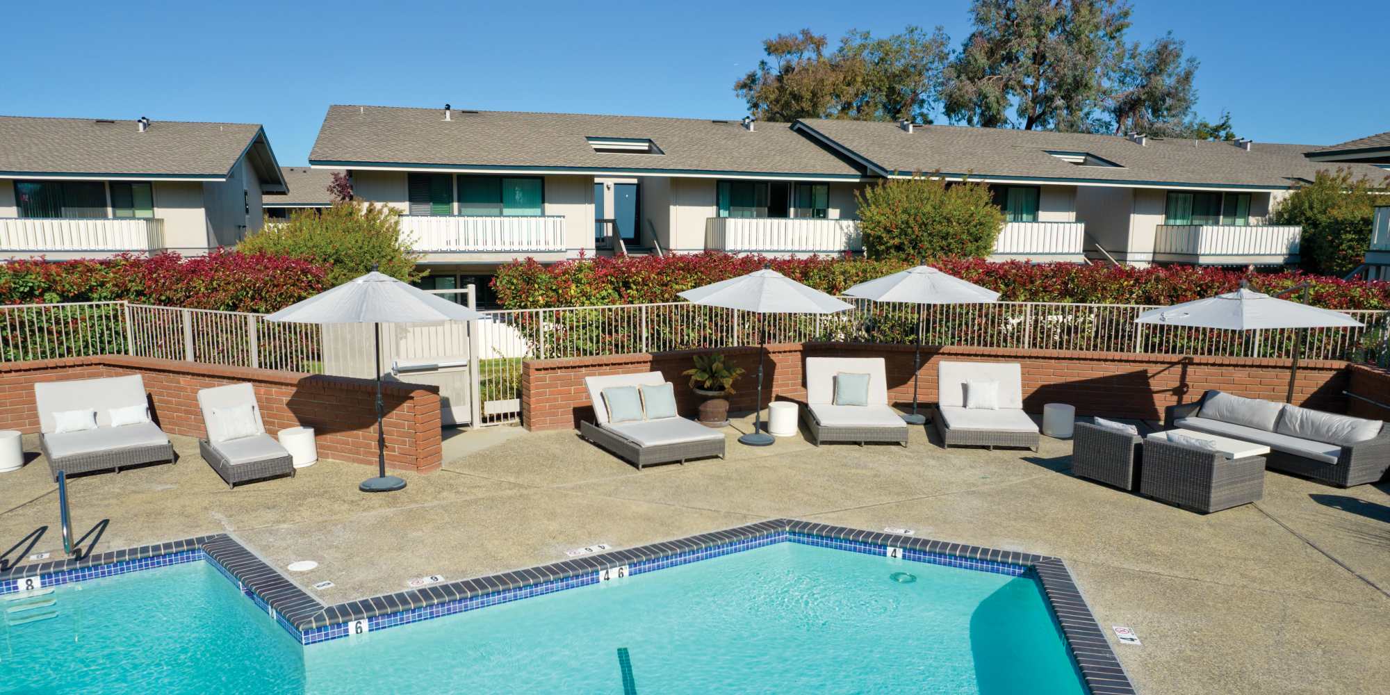 Pool and Pool Deck with seating at Shadow Cove in Foster City, California