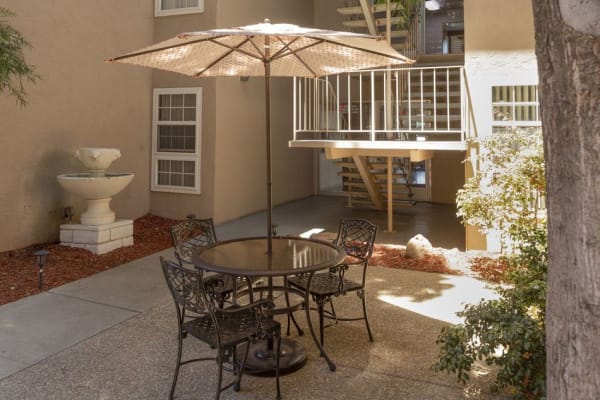 Shaded picnic table at Bancroft Towers in San Leandro, California