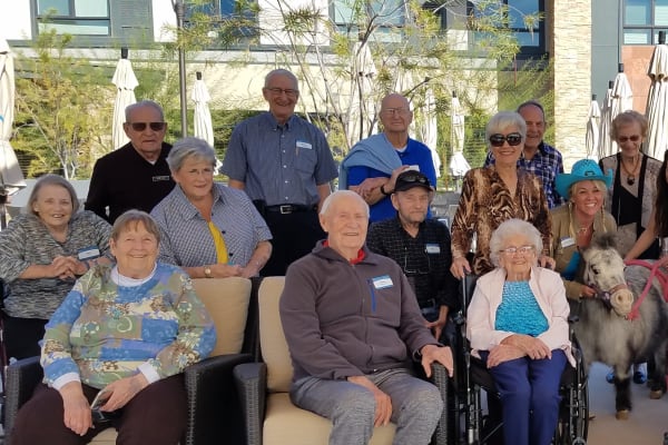 Residents pose for a picture at Merrill Gardens at Anthem in Anthem, Arizona. 