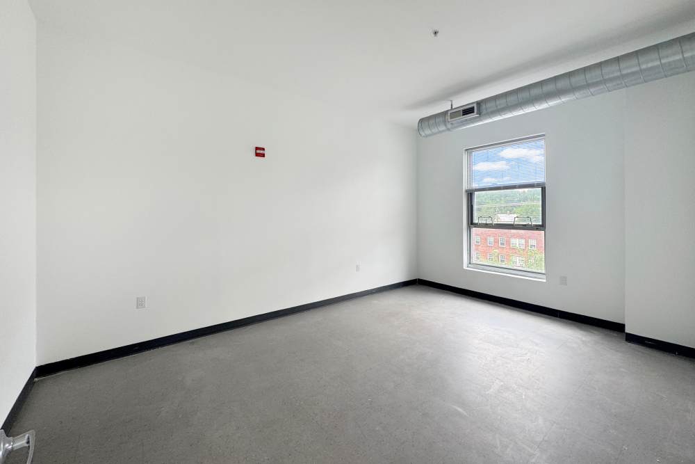 Unfurnished bedroom at Artspace Lofts Mount Rainier in Mount Rainier,Maryland