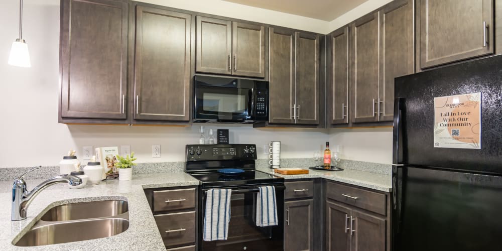 Granite countertops in an apartment kitchen at Glenmoor Oaks in Moseley, Virginia