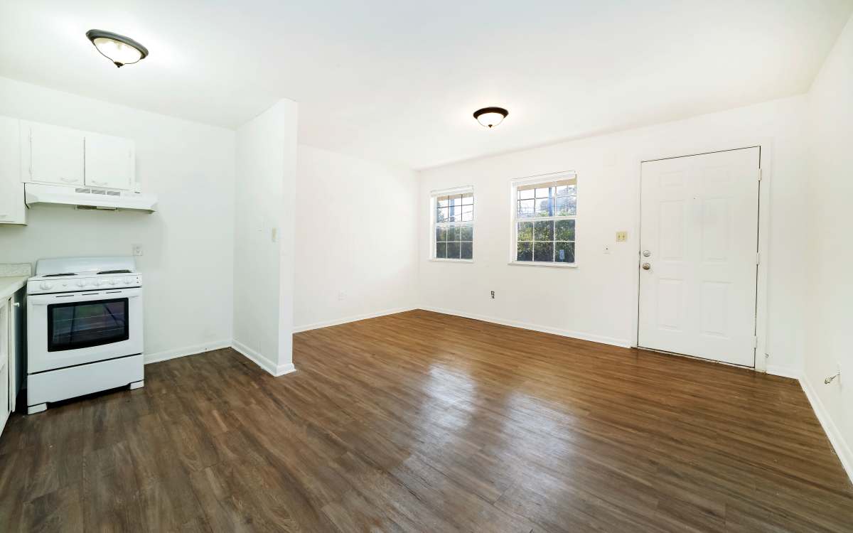 Living room with open kitchen at Magnolia Terrace in Tallahassee, Florida