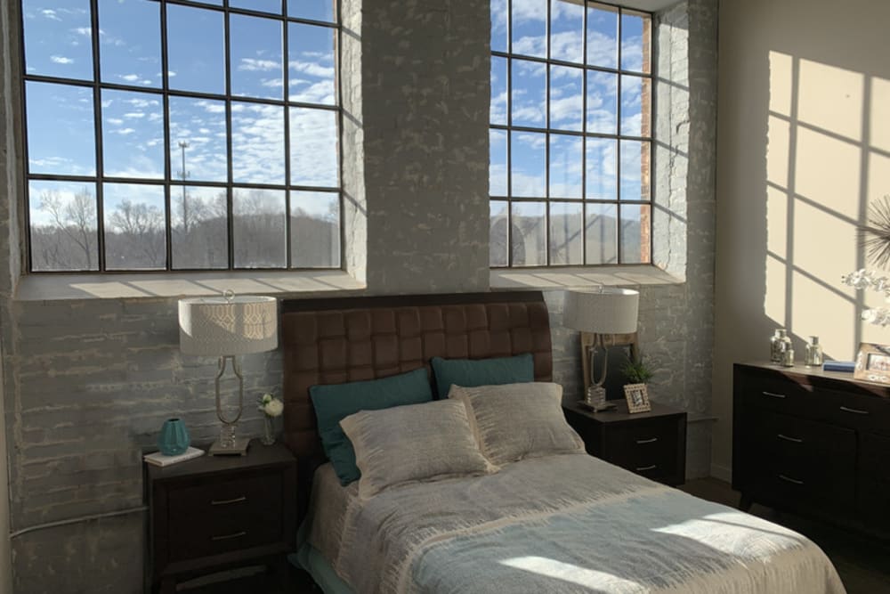 A furnished bedroom at Bellevue Mill in Hillsborough, North Carolina