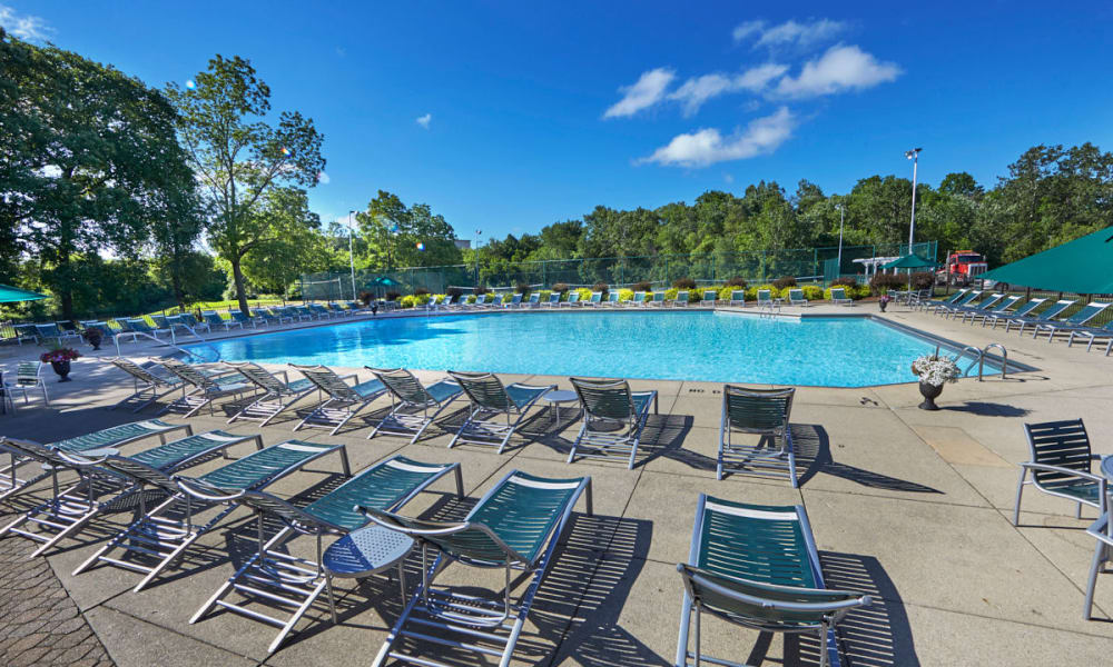 Shimmering swimming pool with sundeck on a sunny day at Muirwood in Farmington Hills, Michigan