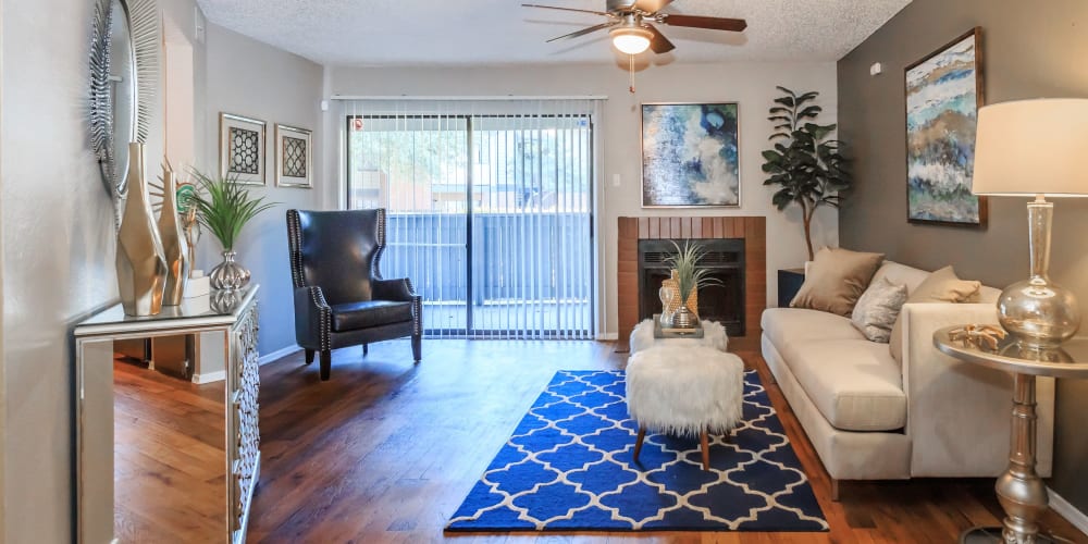 Comfortable living room in an apartment at Tides at Highland Meadows in Dallas, Texas