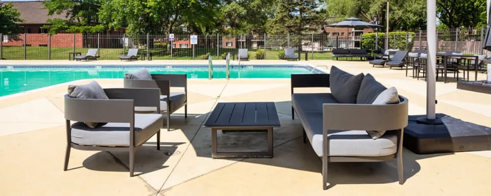 Swimming pool with lounge chairs at Terraces of Elk Grove in Elk Grove Village, Illinois