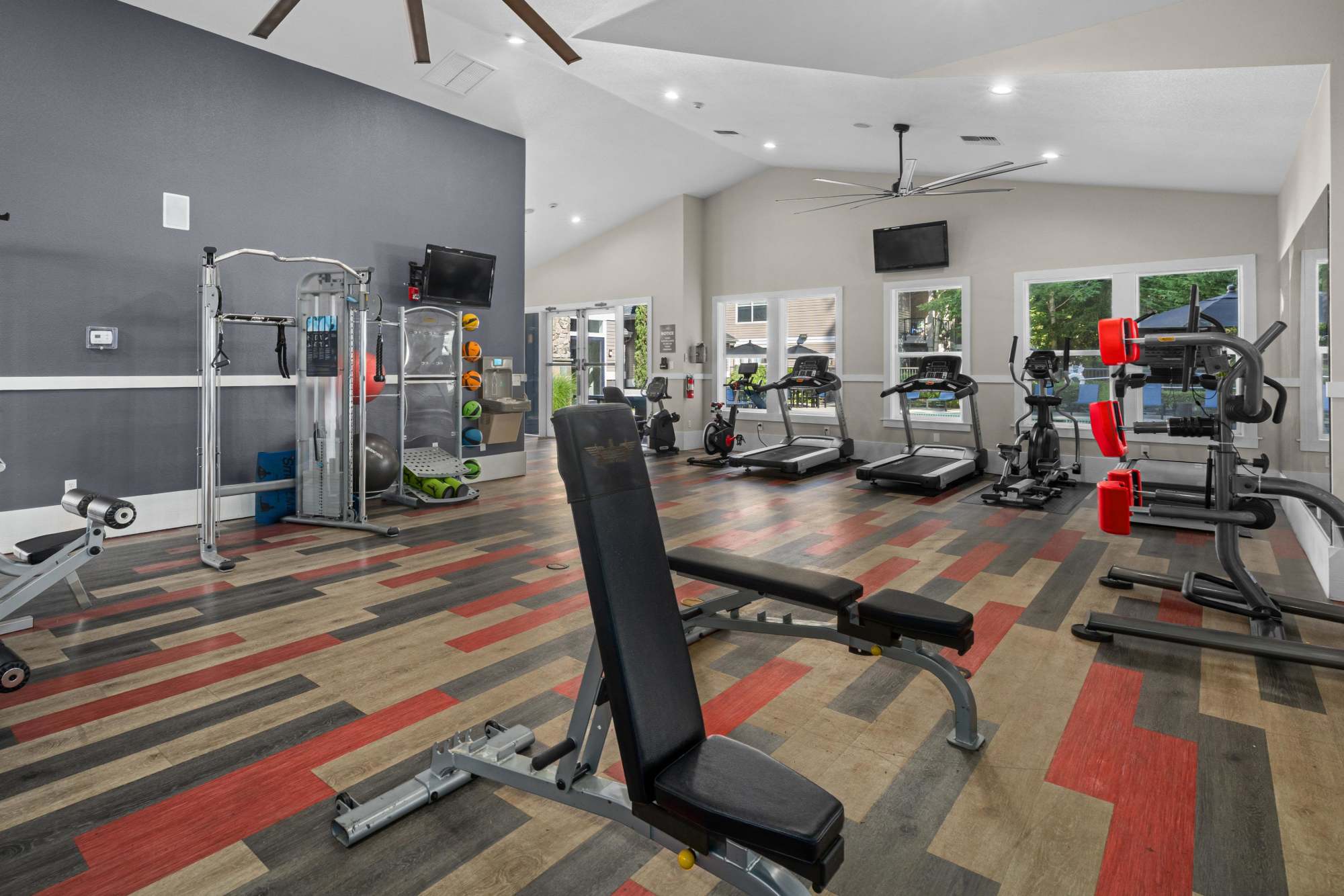 Clean, modern community gym at Wildreed Apartments in Everett, Washington