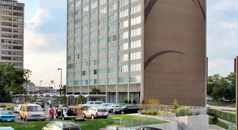Property exterior with peaceful neighborhood at Council Tower Apartments in Saint Louis, Missouri