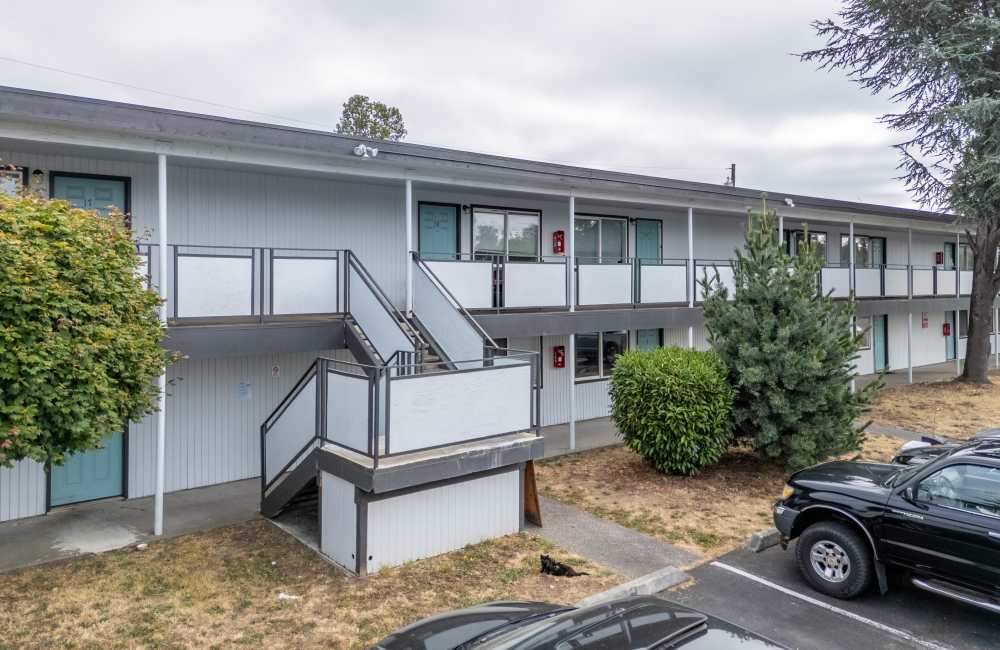 View of exterior stairs of apartments at Twin oak apartments 