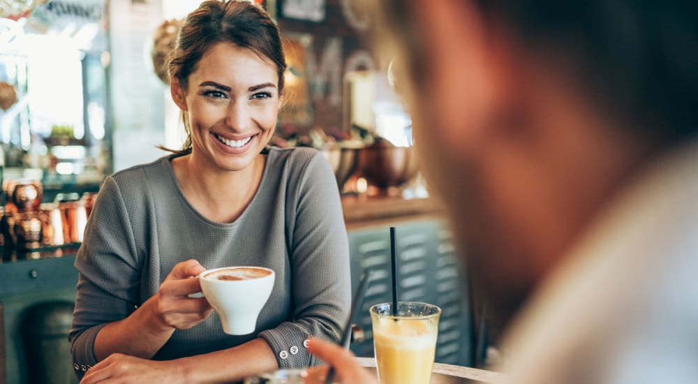 Residents enjoy a cup of coffee near Hamilton Place in Pittsburgh, Pennsylvania