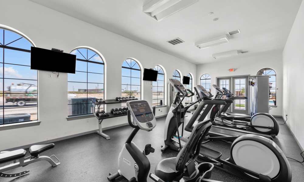 Fitness center with treadmills at District At Pellicano in El Paso, Texas