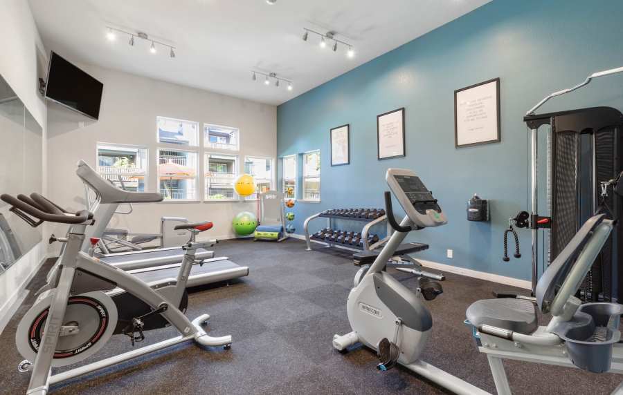 Gym with bike and free weights at Foundry on Fifth in Renton, Washington