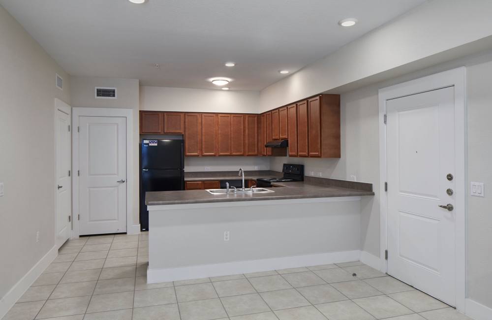 Kitchen with tile flooring at Cardinal Point in Austin, Texas