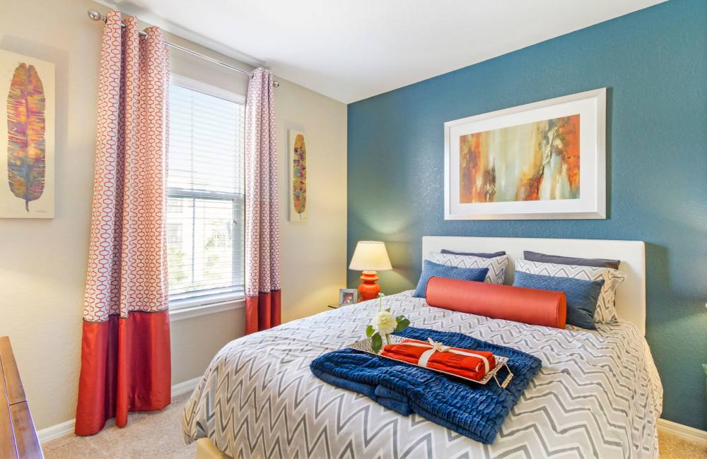 Cozy bedroom with a large bed at Sagewood in El Paso, Texas