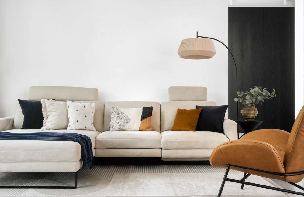 Modern furnishings in a model home's living space at Hillside Apartments in Laredo, Texas