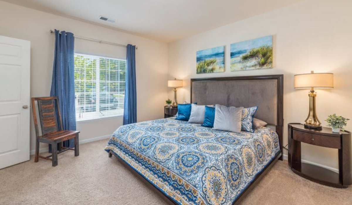 Spacious bedroom with large windows at Palisades at New River in Hardeeville, South Carolina