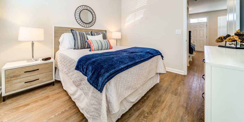 Bedroom with large comfortable bed at Seaglass Cottage in North Myrtle Beach, South Carolina