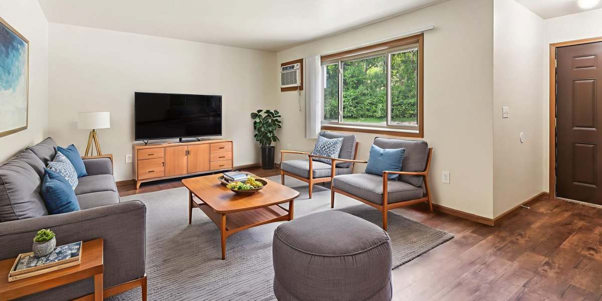 Living room with television at Equity Property Management LLC in Merrillville, Indiana